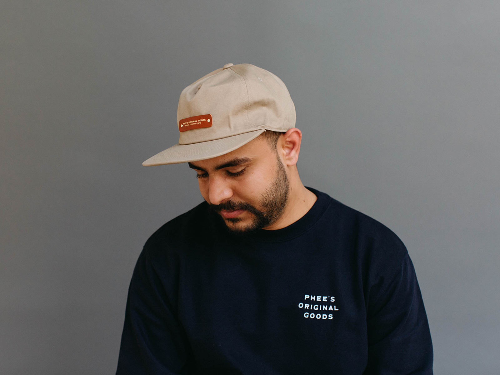 Shubham looking sharp in the khaki North Atlantic Hat with leather patch and gold embossing