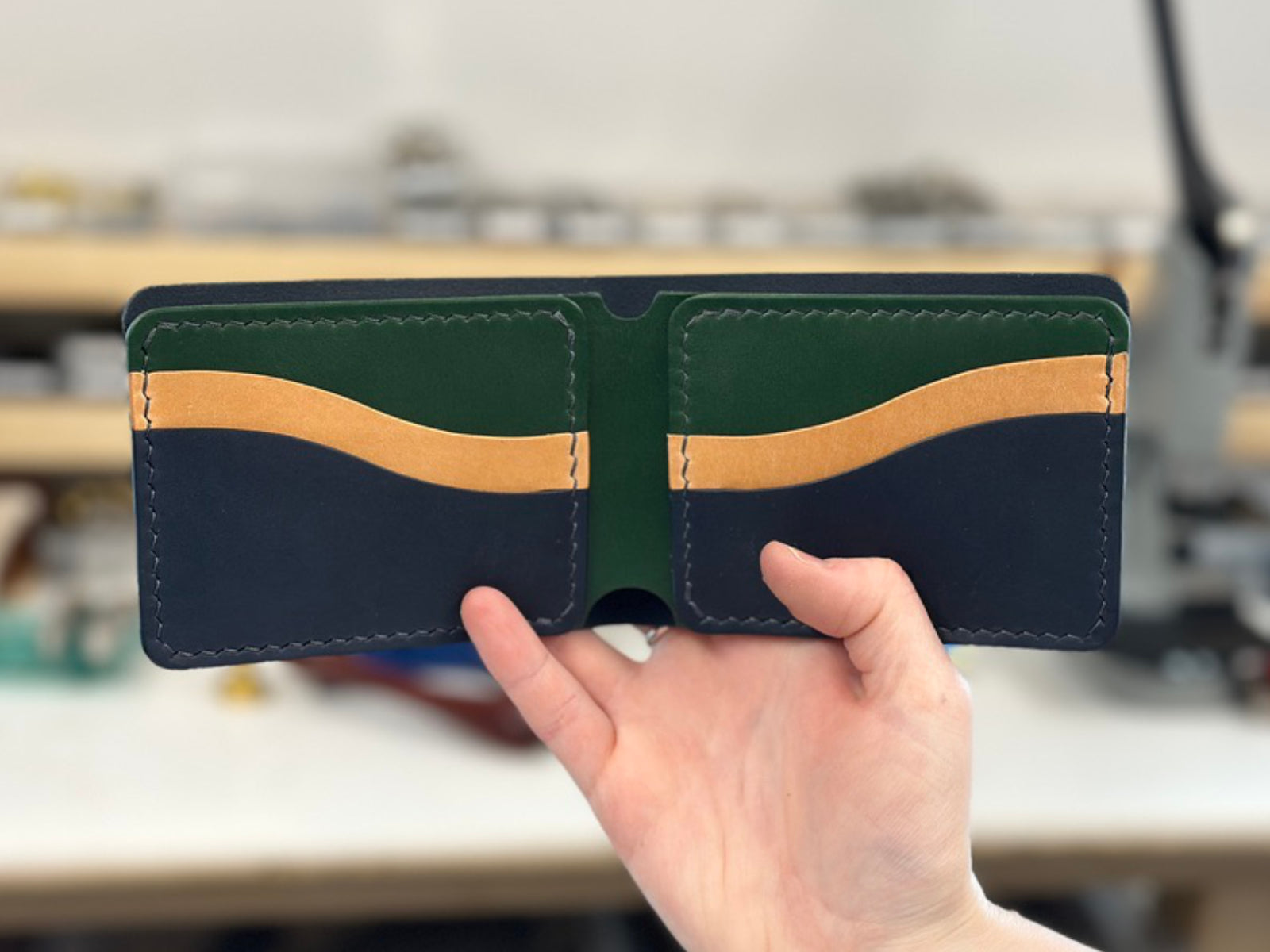 Build your own custom veg-tan leather wallet in navy, russet and pine 