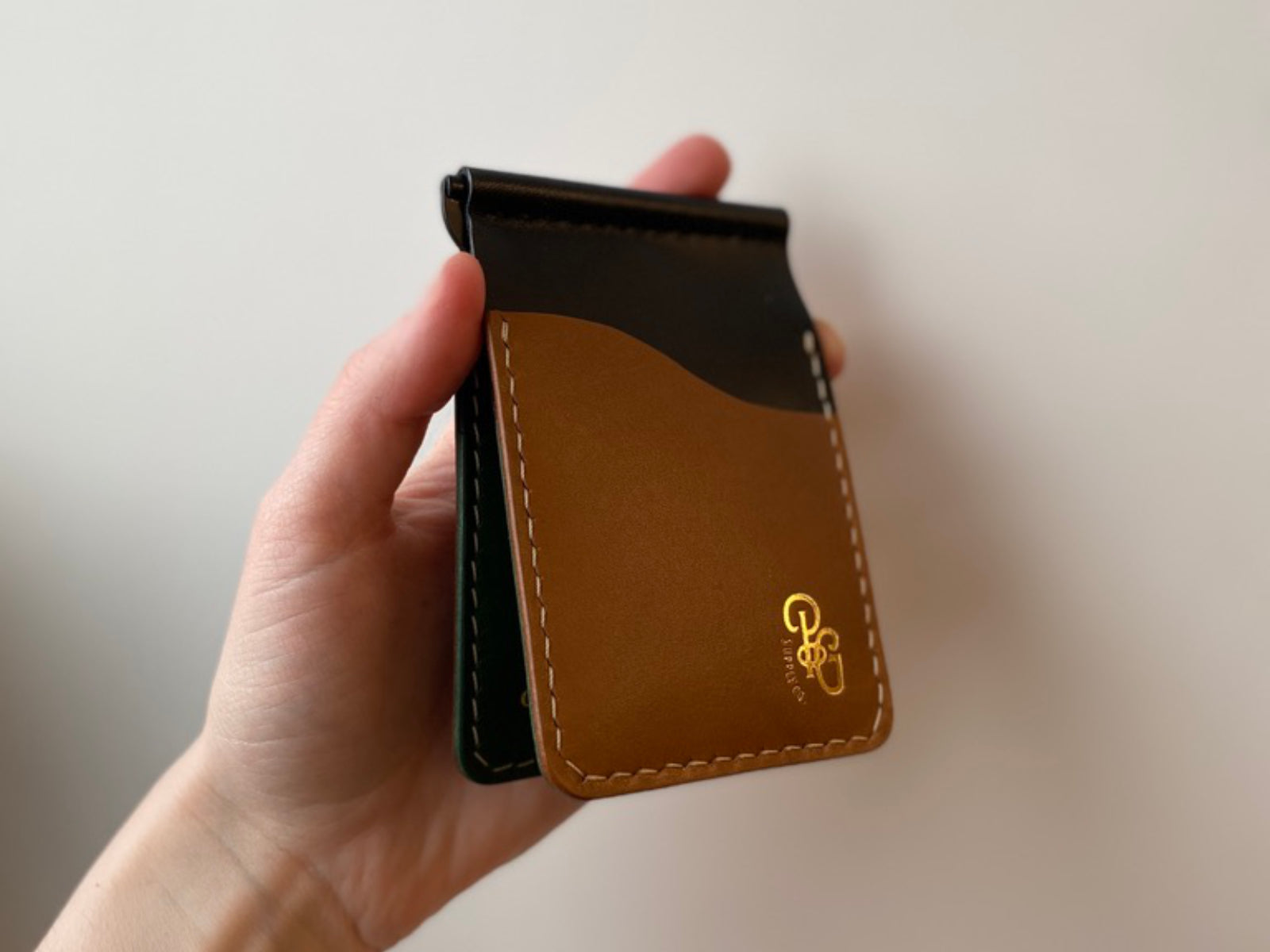 Build your own custom dunvegan money clip wallet with black, tan and pine leather