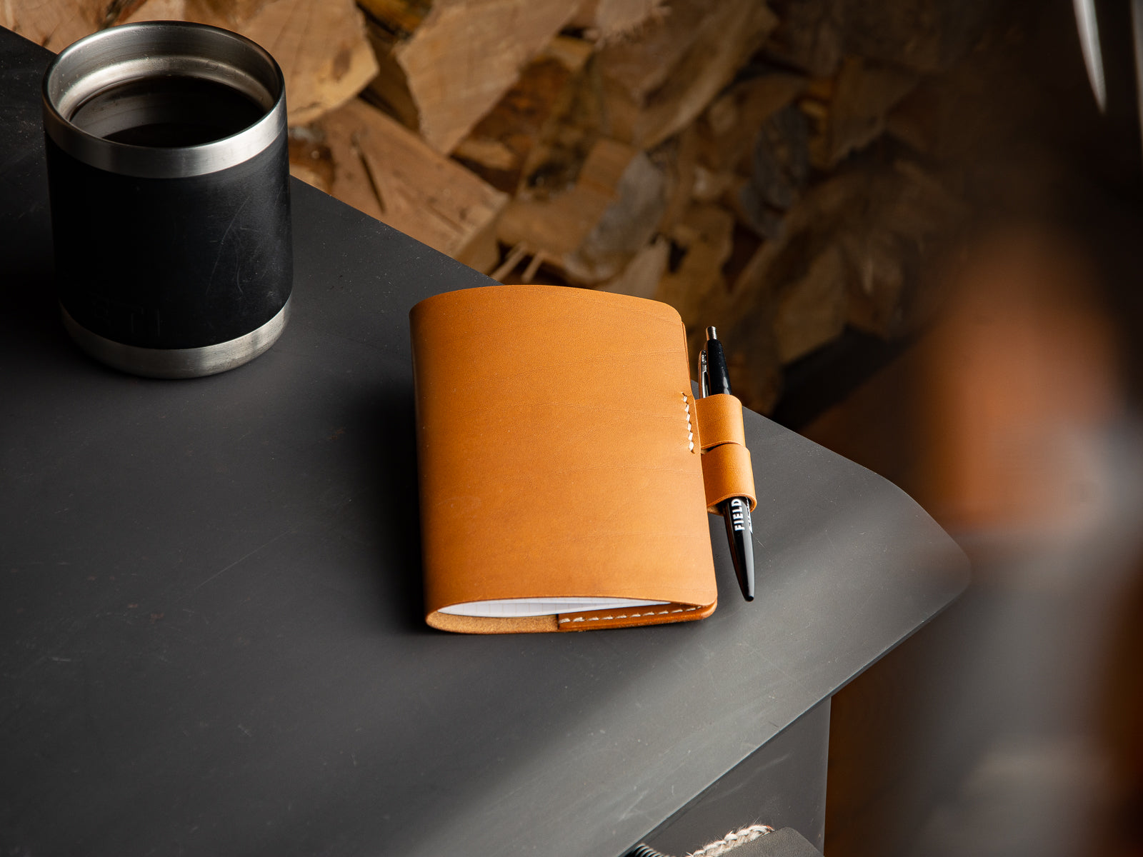 Leather Notebook Sleeve in tan veg-tan leather with pen closure