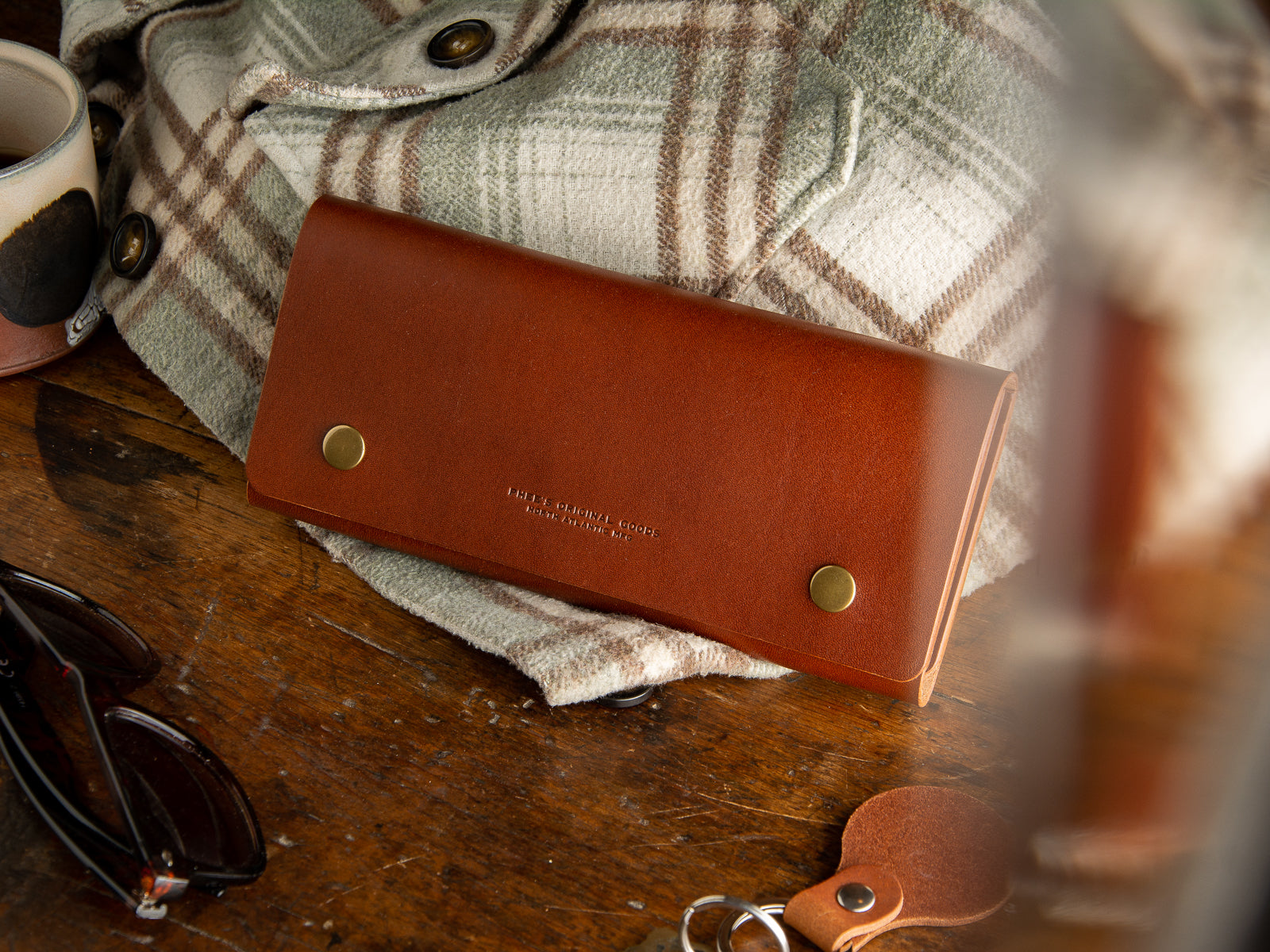 Glendale clutch wallet with optional wrist strap in brown full grain leather
