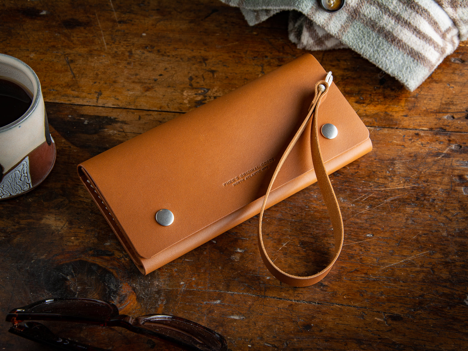 Glendale clutch wallet with optional wrist strap in tan full grain leather