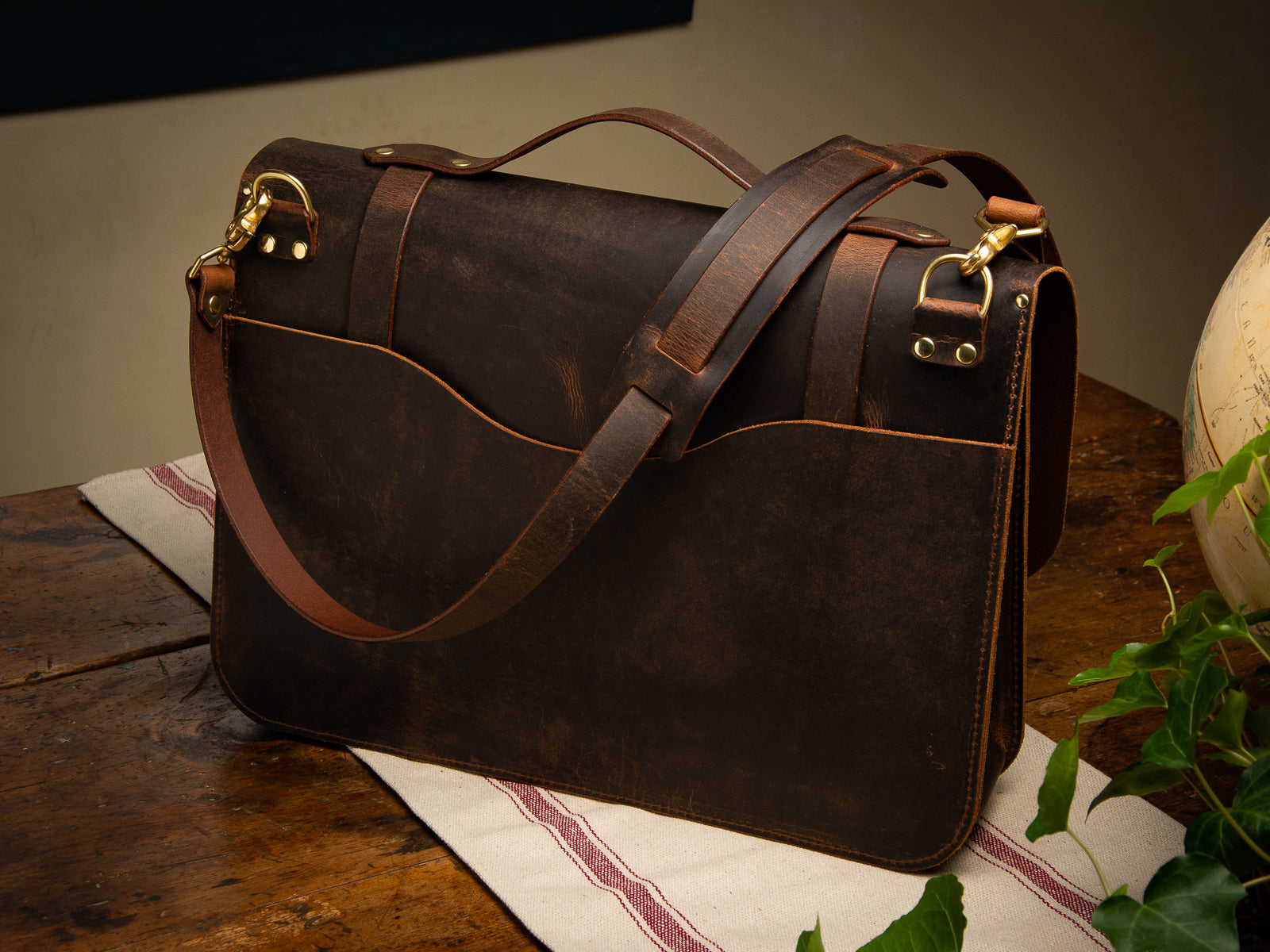 Back of brown Glengarry side bag with shoulder strap