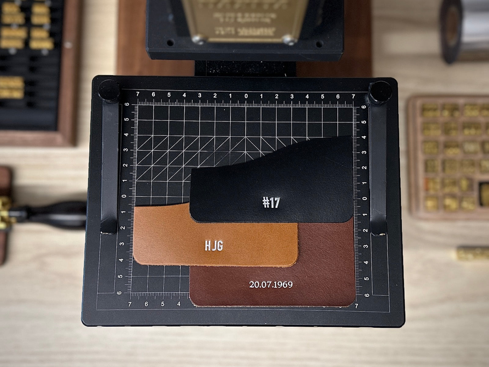 3 veg-tan leather wallet pockets monogrammed with silver foil