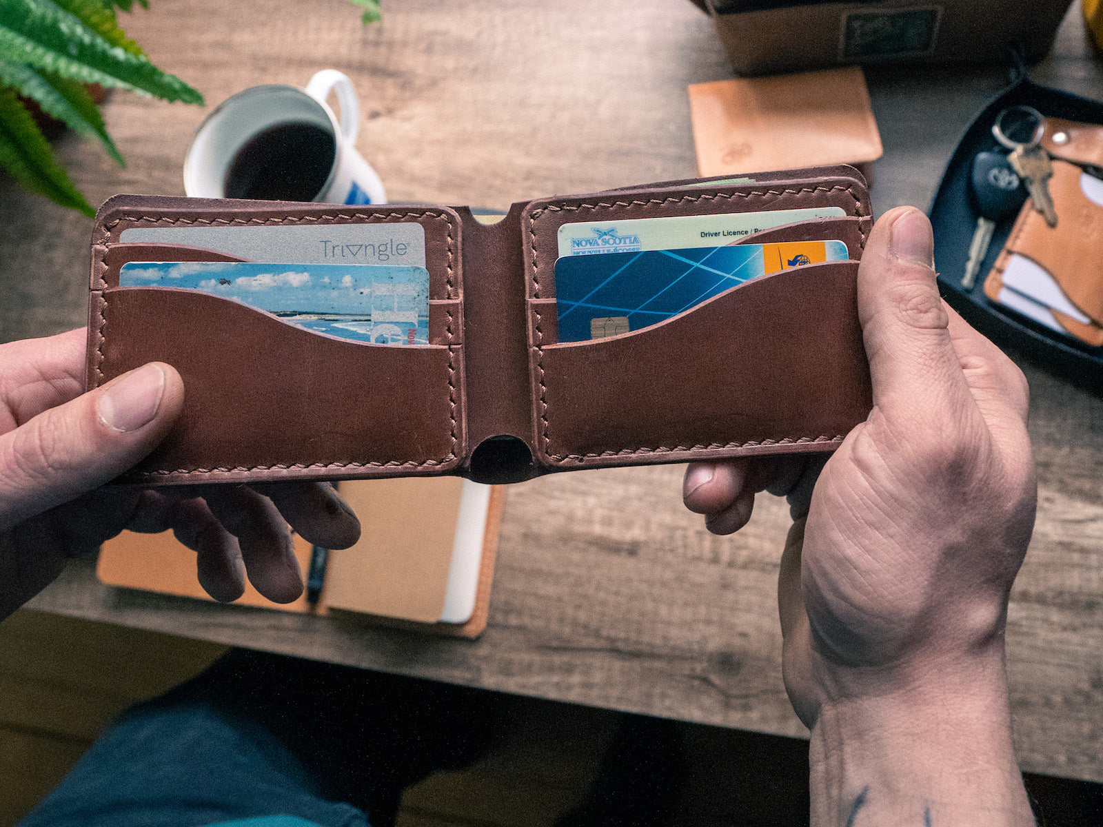 Open Bucklaw Wallet in brown veg-tan leather