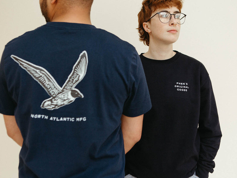 Showing the back on the navy Gull tee with screenprinted seagull