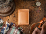 Hand sewn tan leather Bateston bi-fold wallet with exterior cash slot