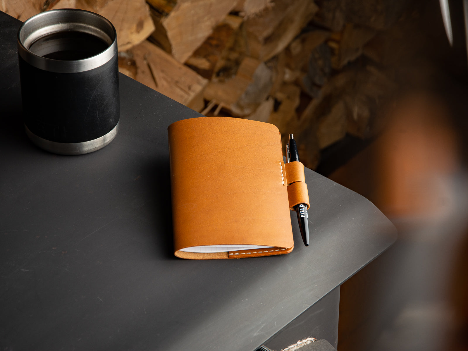 Leather Notebook Sleeve in tan veg-tan leather with pen closure