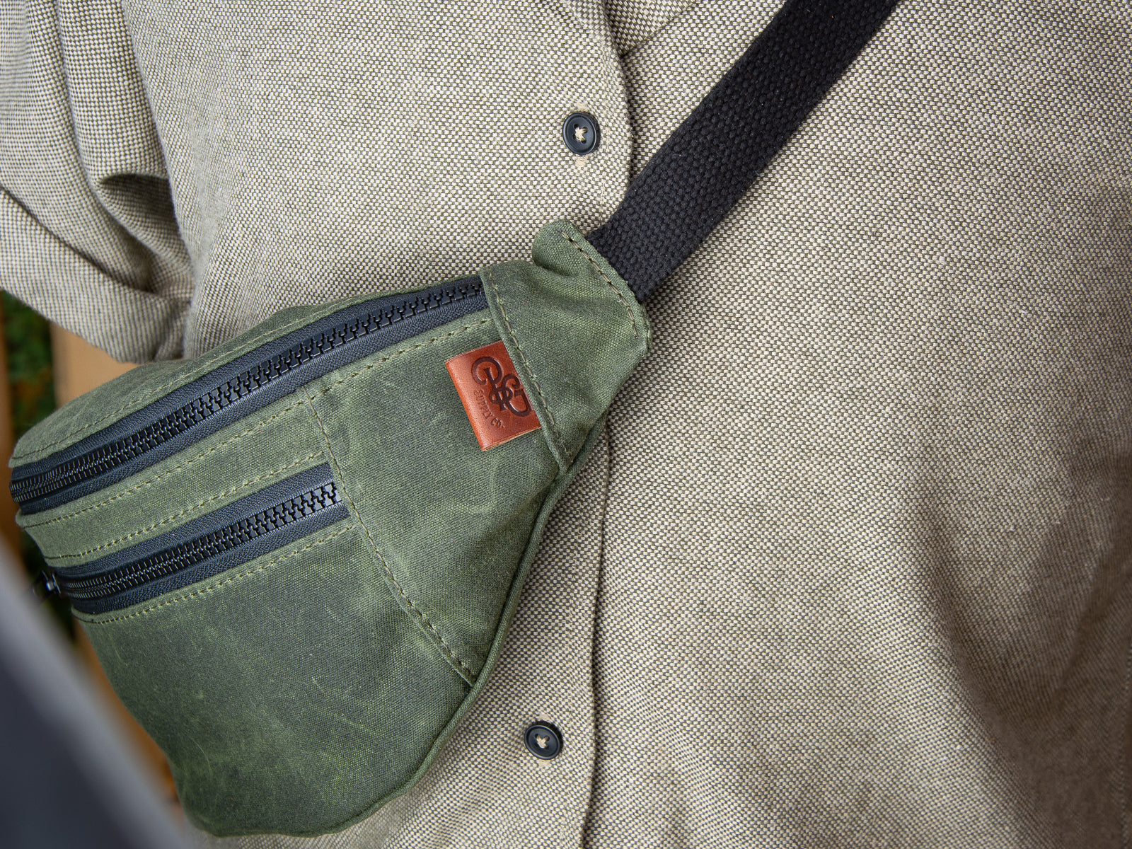 Olive green waxed canvas franey fanny pack with cotton webbing strap