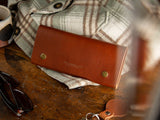 Glendale clutch wallet with optional wrist strap in brown full grain leather 