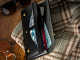 Glendale clutch wallet with optional wrist strap in black full grain leather 