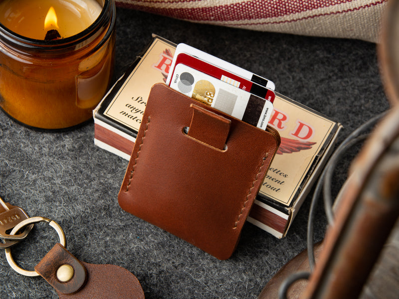 back of handmade kenloch pull tab card wallet in brown veg-tan leather