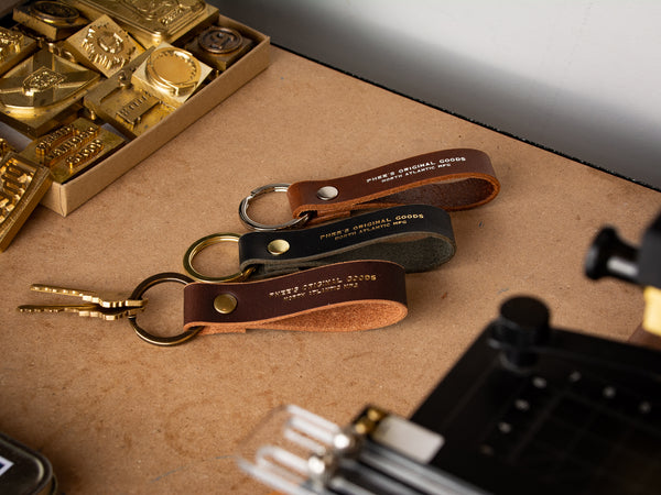 Leather loop keychain in brown, black and tan
