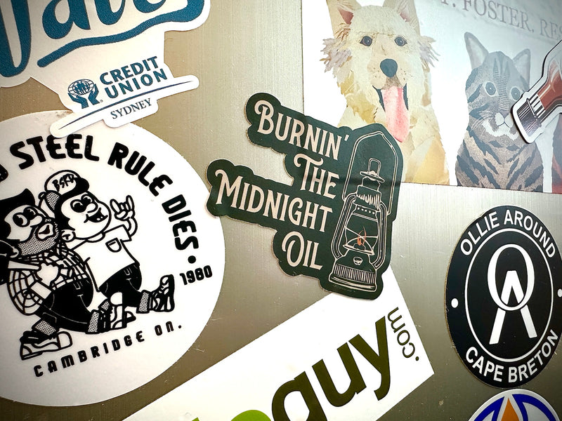 Oil Lamp Sticker on a mini fridge surrounded by other cool stickers