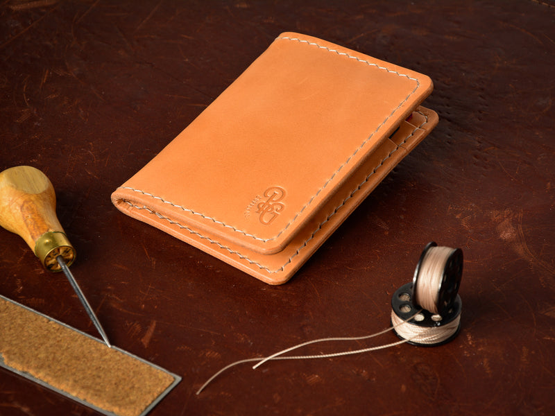 Barra bifold leather wallet in russet - front