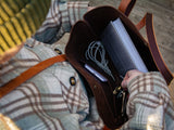 Inside of the Big Bras d'Or tote bag in brown leather, showing key hook and two small pockets