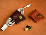 Leather cord keep with snap in brown and chestnut