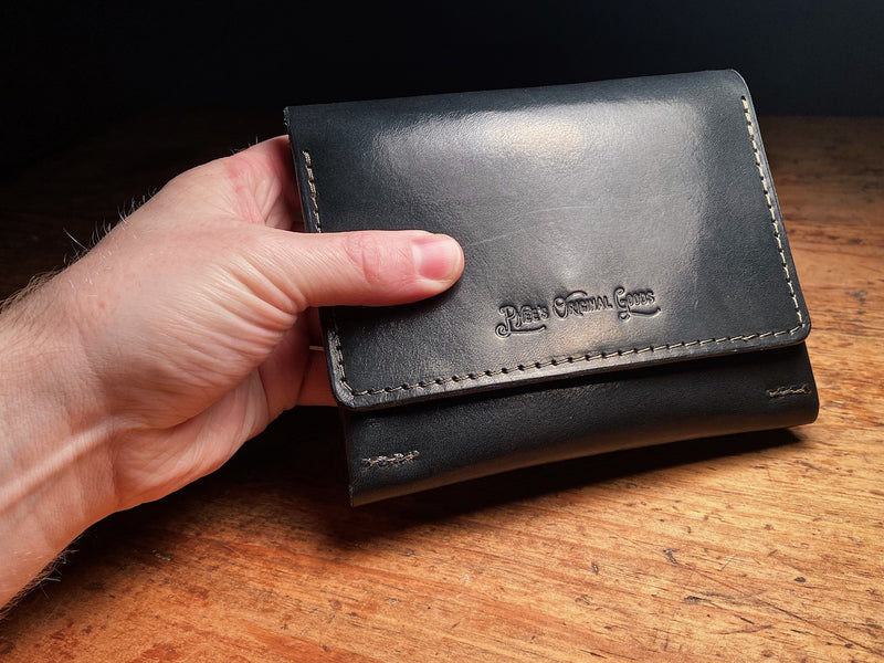 vegtable tanned black leather fly wallet, with debossed logo