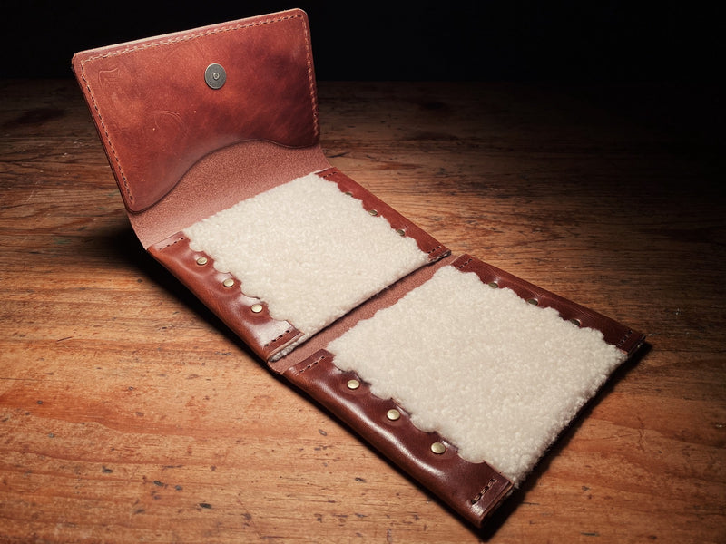 brown fly fishing wallet, with sheepskin liner, solid brass hardware